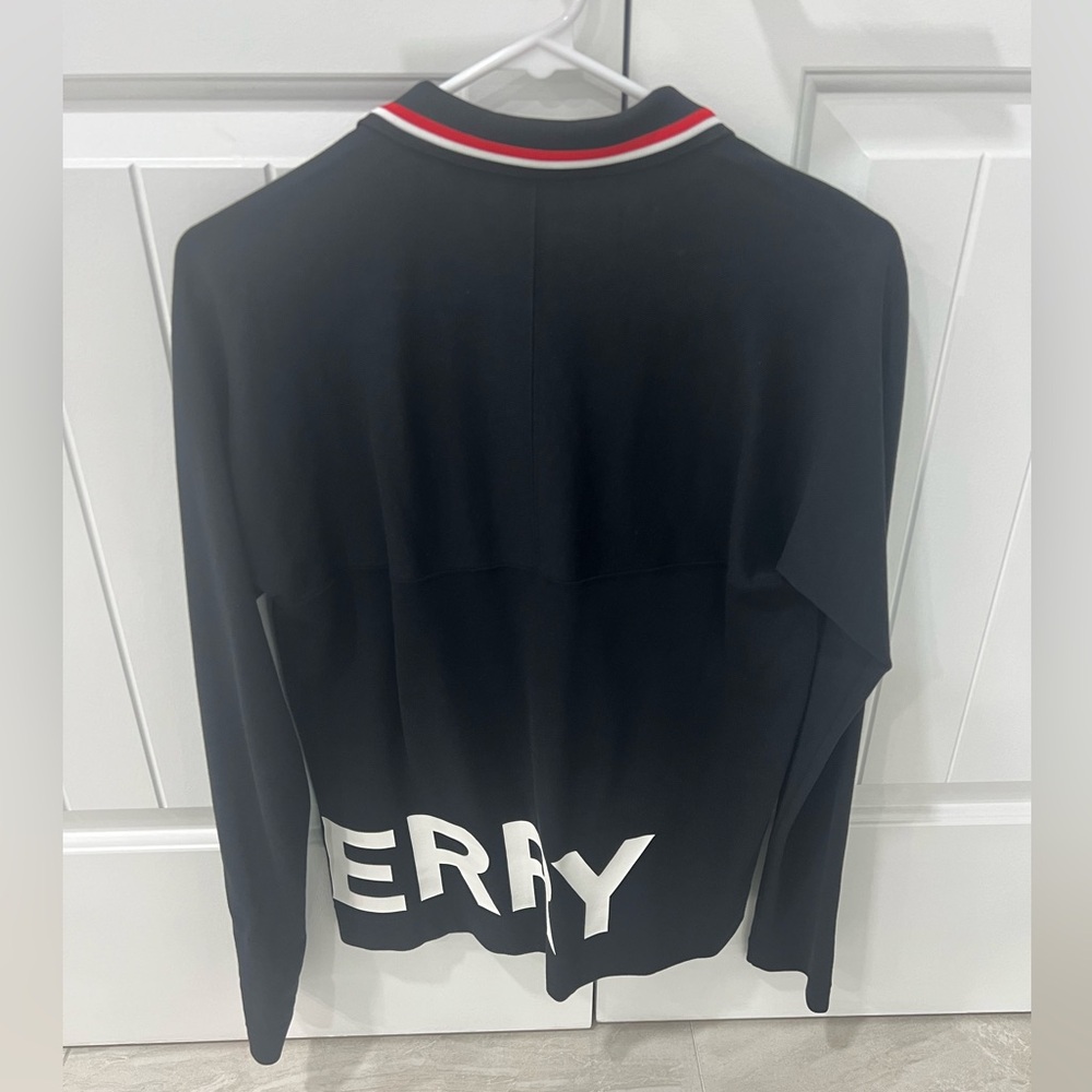 Burberry polo shirt for boys. Size 14 and the color is black and white. - Picture 2 of 4